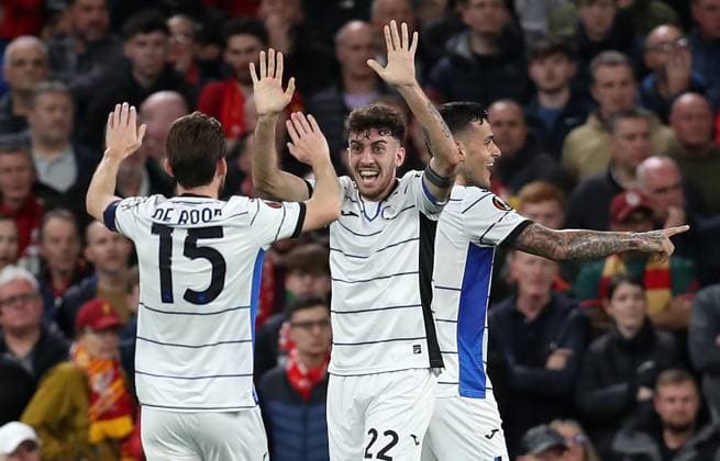 11th April 2024; Anfield, Liverpool, Merseyside, England; Europa League, Quarter Final;, First Leg Football, Liverpool versus Atalanta; Marten de Roon and Matteo Ruggieri of Atalanta celebrate their side& x2019;s 39th minute opening goal  ActionPlus12628483 DavidxBlunsden