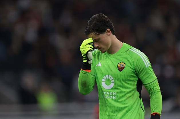 Milan, Italy, 11th April 2024. Mile Svilar of AS Roma reacts during the UEFA Europa League match at Giuseppe Meazza, Milan. Picture credit should read: Jonathan Moscrop Sportimage EDITORIAL USE ONLY. No use with unauthorised audio, video, data, fixture lists, club league logos or live services. Online in-match use limited to 120 images, no video emulation. No use in betting, games or single club league player publications. SPI-3069-0014