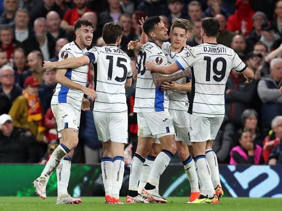 11th April 2024; Anfield, Liverpool, Merseyside, England; Europa League, Quarter Final;, First Leg Football, Liverpool versus Atalanta; Gianluca Scamacca of Atalanta celebrates with his team mates after scoring to give his side a 0-1 lead after 39 minutes  ActionPlus12628485 DavidxBlunsden