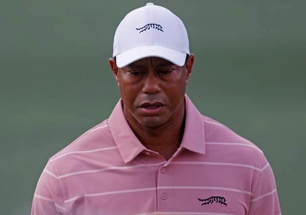 Tiger Woods walks down the fairway on the second hole during the first round of the Masters Tournament at Augusta National Golf Club in Augusta, Georgia on Thursday, April 11, 2024.  AUG20240411593 TANNENxMAURY