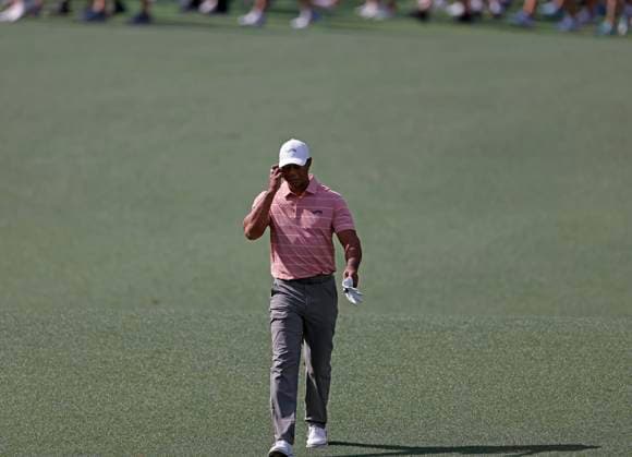 Tiger Woods walks down the fairway on the second hole during the first round of the Masters Tournament at Augusta National Golf Club in Augusta, Georgia on Thursday, April 11, 2024.  AUG20240411594 TANNENxMAURY