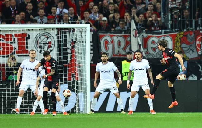 Jonas Hofmann of Beyern Leverkusen scores the opening goal Bayer 04 Leverkusen v West Ham United, UEFA Europa League, Quarter Final, First Leg, Football, BayArena, Leverkusen, Germany - 11 Apr 2024 EDITORIAL USE ONLY No use with unauthorised audio, video, data, fixture lists, club league logos or live services. Online in-match use limited to 120 images, no video emulation. No use in betting, games or single club league player publications. Copyright: xMichaelxZemanek Shutterstockx 14424882ad