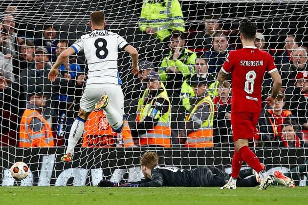 Mario Pasalic of Atalanta scores a goal for their side to make it 3-0 Liverpool v Atalanta, UEFA Europa League, Quarter Final, First Leg, Football, Anfield, Liverpool, UK - 11 Apr 2024 EDITORIAL USE ONLY No use with unauthorised audio, video, data, fixture lists, club league logos or live services. Online in-match use limited to 120 images, no video emulation. No use in betting, games or single club league player publications. Copyright: xMattxWest Shutterstockx 14424886bx