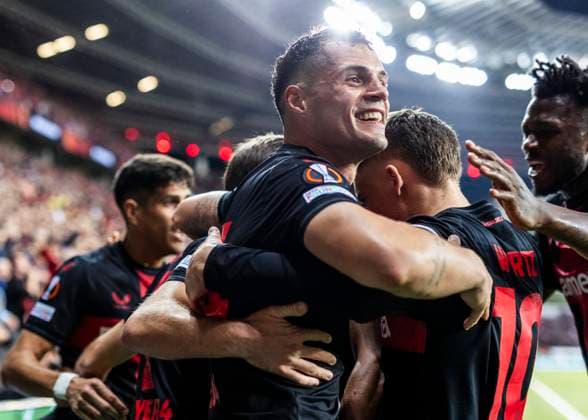 Leverkusen, Bayarena, 11.04.2024: Jonas Hofmann (Leverkusen) celebrates scoring the 1:0 goal with Granit Xhaka (Leverkusen) during the Europa League match Bayer 04 Leverkusen vs. West Ham United.