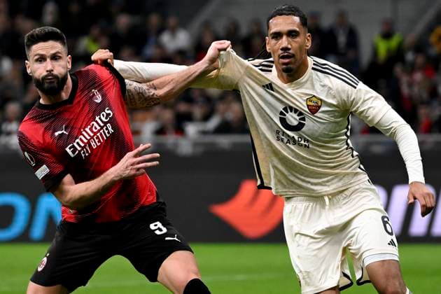 Sport Bilder des Tages Olivier Giroud of AC Milan and Chris Smalling of AS Roma during the Europa League football match between AC Milan and AS Roma at San Siro stadium in Milano (Italy), April 11th, 2024. AndreaxStaccioli