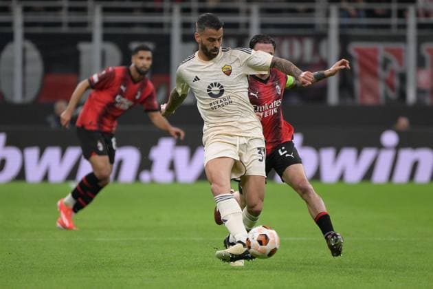 11th April 2024, Stadio San Siro, Milan, Italy; Europa League, Quarter- finals 1st leg; Milan versus Roma; Leonardo Spinazzola of AS Roma holds off Davide Calabria of AC Milan  ActionPlus12628641 AllShotLive