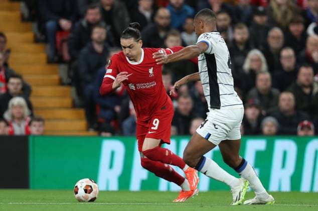 11th April 2024; Anfield, Liverpool, Merseyside, England; Europa League, Quarter Final;, First Leg Football, Liverpool versus Atalanta; Darwin Nunez of Liverpool takes on Isak Hien of Atalanta  ActionPlus12628902 DavidxBlunsden