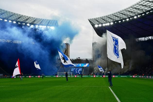 Pyrotechnik, Fans FC Hansa Rostock, GER, Hertha BSC vs. FC Hansa Rostock, Fussball Herren, 2. Bundesliga, Saison 2023 2024, 29. Spieltag, 12.04.2024. (DFL REGULATIONS PROHIBIT ANY USE OF PHOTOGRAPHS AS IMAGE SEQUENCES AND OR QUASI - VIDEO). GER, Hertha BSC vs. FC Hansa Rostock, Fussball Herren, 2. Bundesliga, Saison 2023 2024, 29. Spieltag, 12.04.2024. Berlin