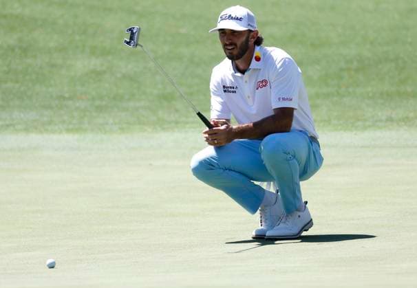Max Homa lines up a putt on the eighth hole in the second round of the Masters Tournament at Augusta National Golf Club in Augusta, Georgia on Friday, April 12, 2024.  AUG20240412104 JOHNxANGELILLO