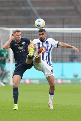 12.04.2024, xtgx, Fussball 2. Bundesliga, Hertha BSC - Hansa Rostock emspor, v.l. Dennis Dressel (Rostock, 6), Aymen Barkok (Hertha, 18) Zweikampf, Duell, Kampf, tackle (DFL DFB REGULATIONS PROHIBIT ANY USE OF PHOTOGRAPHS as IMAGE SEQUENCES and or QUASI-VIDEO) Berlin