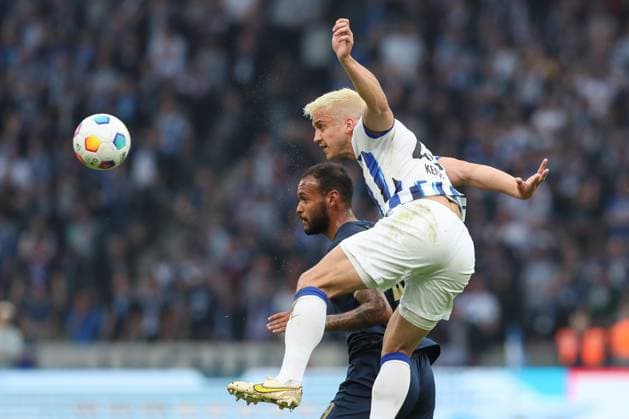 12.04.2024, xtgx, Fussball 2. Bundesliga, Hertha BSC - Hansa Rostock emspor, v.l. Junior Brumado (Rostock, 49), Marc Oliver Kempf (Hertha, 20) Zweikampf, Duell, Kampf, tackle (DFL DFB REGULATIONS PROHIBIT ANY USE OF PHOTOGRAPHS as IMAGE SEQUENCES and or QUASI-VIDEO) Berlin