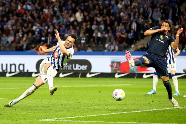 12.04.2024, xtgx, Fussball 2. Bundesliga, Hertha BSC - FC Hansa Rostock emspor, v.l. Haris Tabakovic (Hertha BSC Berlin) Jonas David (FC Hansa Rostock) (DFL DFB REGULATIONS PROHIBIT ANY USE OF PHOTOGRAPHS as IMAGE SEQUENCES and or QUASI-VIDEO) Berlin