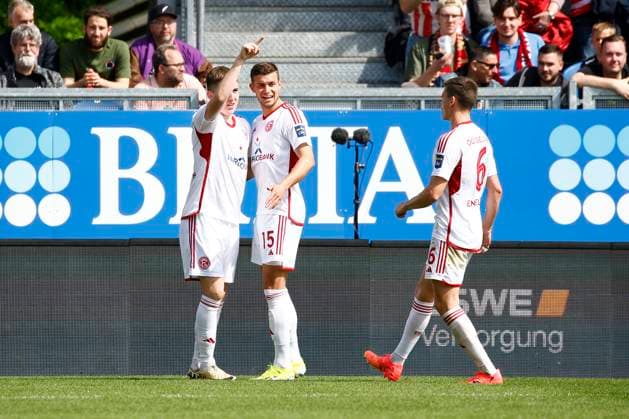 13.04.2024, xavx, Fussball 2.Bundesliga, SV Wehen Wiesbaden - Fortuna Düsseldorf emspor, v.l. Ãsak Johannesson (Fortuna Düsseldorf) celebrate the goal, Der Torjubel zum 0:2 (DFL DFB REGULATIONS PROHIBIT ANY USE OF PHOTOGRAPHS as IMAGE SEQUENCES and or QUASI-VIDEO) Wiesbaden