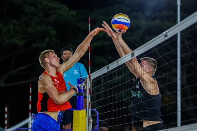 (240414) -- LAGUNA PROVINCE, April 14, 2024 -- Latvia s Toms Liepa (R) competes against Czech Republic s Tomas Semerad (L) during the men s quarterfinals match between Toms Liepa Ernests Puskundzis of Latvia and Tomas Semerad Adam Miroslav Stocek of Czech Republic at the Volleyball World Beach Pro Tour Futures in Laguna Province, the Philippines, April 13, 2024. ) (SP)THE PHILIPPINES-LAGUNA PROVINCE Beach volleyball, Beachvolleyball BEACH PRO TOUR FUTURES-QUARTERFINALS ROUELLExUMALI 