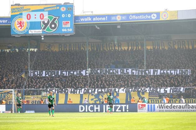 14.04.2024, xtgx, Fussball 2. Bundesliga, Fussball 2. Bundesliga, Eintracht Braunschweig - Hannover 96 emspor, v.l. Spruchband Banner gegen Innenministerin Daniela Behrens. Niemand hat dich gewaehlt, Behrens halts Maul (DFL DFB REGULATIONS PROHIBIT ANY USE OF PHOTOGRAPHS as IMAGE SEQUENCES and or QUASI-VIDEO) Braunschweig