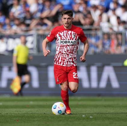 14.04.2024, xdcx, Fussball Bundesliga, SV Darmstadt 98 - SC Freiburg, emonline, emspor, despor, v.l., Florent Muslija (SC Freiburg) DFL DFB REGULATIONS PROHIBIT ANY USE OF PHOTOGRAPHS AS IMAGE SEQUENCES AND OR QUASI-VIDEO. Copyright: HMBxMedia Claus