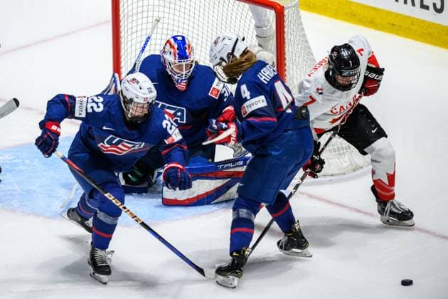 240414 Tessa Janecke, goaltender Aerin Frankel and Caroline Harvey of USA against Laura Stacey of Canada during the 2024 IIHF Women s World Championship, WM, Weltmeisterschaft final between USA and Canada on April 14, 2024 in Utica. Photo: Aron Broman BILDBYRAN COP 341 AM0053 ishockey Ice hockey, Eishockey vm dam 2024 iihf womens world championship dam vm ishockey vm final usa canada kanada women bbeng Copyright: ARONxBROMAN BB240414AM087