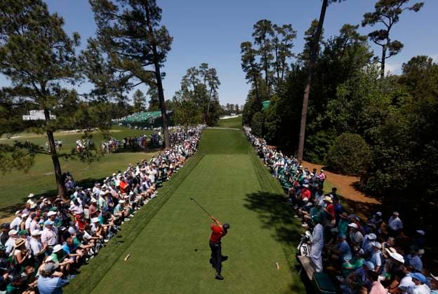 Tiger Woods hits his tee shot on the 18th hole in the final round of the Masters Tournament at Augusta National Golf Club in Augusta, Georgia on Sunday, April 14, 2024. Woods played his 100th round at Augusta National and shot 16-over for the tourney to finish at the bottom of the leaderboard.  AUG202404141003 JOHNxANGELILLO