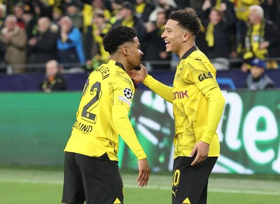 Jadon Sancho of Borussia Dortmund celebrates scoring his sides second goal with team-mate Ian Maatsen Borussia Dortmund v Atletico Madrid, UEFA Champions League, Quarter Final, Second Leg, Football, Signal Iduna Park, Dortmund, Germany - 16 Apr 2024 EDITORIAL USE ONLY No use with unauthorised audio, video, data, fixture lists, club league logos or live services. Online in-match use limited to 120 images, no video emulation. No use in betting, games or single club league player publications. Copyright: xMichaelxZemanek Shutterstockx 14434932s