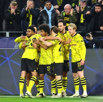 Julian Brandt of Borussia Dortmund celebrates scoring the opening goal with team-mates Borussia Dortmund v Atletico Madrid, UEFA Champions League, Quarter Final, Second Leg, Football, Signal Iduna Park, Dortmund, Germany - 16 Apr 2024 EDITORIAL USE ONLY No use with unauthorised audio, video, data, fixture lists, club league logos or live services. Online in-match use limited to 120 images, no video emulation. No use in betting, games or single club league player publications. Copyright: xMichaelxZemanek Shutterstockx 14434932aa