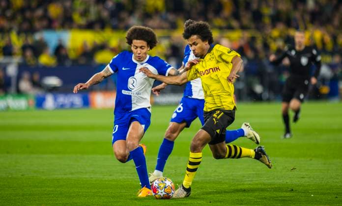 Dortmund Germany. 16th Apr 2024. Karim Adeyemi (BVB) Axel Witsel (Atletico) Borussia Dortmund - Atletico Madrid 16.04.2024