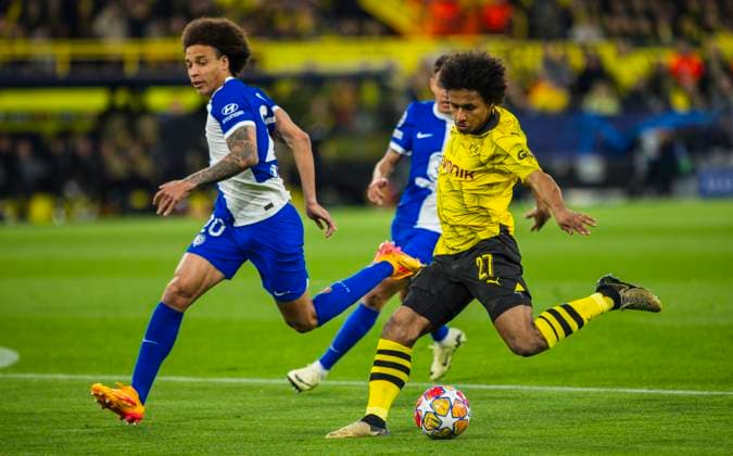 Dortmund Germany. 16th Apr 2024. Karim Adeyemi (BVB) Axel Witsel (Atletico) Borussia Dortmund - Atletico Madrid 16.04.2024