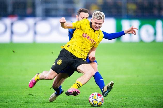 16.04.2024 - Fußball, 2023 2024, UEFA Champions League, Viertelfinale, Borussia Dortmund - Atletico Madrid: (L-R) Saul Niguez Esclapez (Atletico Madrid), Julian Ryerson (Dortmund)