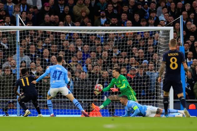 Manchester City v Real Madrid Champions League 17 04 2024. Quarter Final Ederson (31) of Manchester City pushes away an effort from Rodrygo Goes (11) of Real Madrid during the Champions League quarter-final second leg match between Manchester City and Real Madrid at the Etihad Stadium, Manchester, England on 17 April 2024. Manchester Etihad Stadium Manchester England Editorial use only , Copyright: xConorxMolloyx PSI-19472-0037