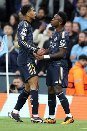 17th April 2024; Etihad Stadium, Manchester, England; Champions League Football, Quarter Final, Manchester City versus Real Madrid; Rodrygo of Real Madrid celebrates with team mate Jude Bellingham after scoring the opening goal after 12 minutes  ActionPlus12631406 DavidxBlunsden