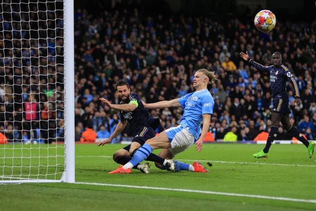 Football - UEFA Champions League - Quarter Final (2nd Leg) - Manchester City v Real Madrid 17th April 2024 - UEFA Champions League - Quarter Final (2nd Leg) - Manchester City v Real Madrid - Nacho Fernandez of Real Madrid clears the ball from Erling Haaland of Manchester City - Photo: Simon Stacpoole Offside. Manchester UK Copyright: xSimonxStacpoolexOffside