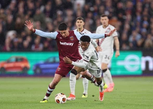 London, England, 18th April 2024. Edson Ãlvarez of West Ham United tackles Nathan Tella of Bayer Leverkusen during the UEFA Europa League match at the London Stadium, London. Picture credit should read: David Klein Sportimage EDITORIAL USE ONLY. No use with unauthorised audio, video, data, fixture lists, club league logos or live services. Online in-match use limited to 120 images, no video emulation. No use in betting, games or single club league player publications. SPI-3091-0022