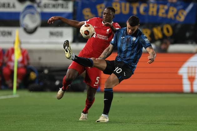Bergamo, Italy, 18th April 2024. Gianluca Scamacca of Atalanta hooks the ball over the head of Ibrahima Konate of Liverpool FC during the UEFA Europa League match at Stadio di Bergamo , Bergamo. Picture credit should read: Jonathan Moscrop Sportimage EDITORIAL USE ONLY. No use with unauthorised audio, video, data, fixture lists, club league logos or live services. Online in-match use limited to 120 images, no video emulation. No use in betting, games or single club league player publications. SPI-3084-0005