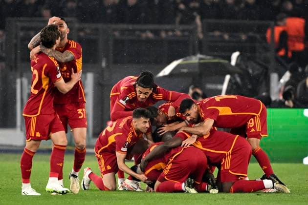 Gianluca Mancini of AS Roma celebrates with team mates after scoring the goal of 1-0 during the Europa League football match between AS Roma and AC Milan at Olimpico stadium in Rome (Italy), April 18th, 2024. AndreaxStaccioli