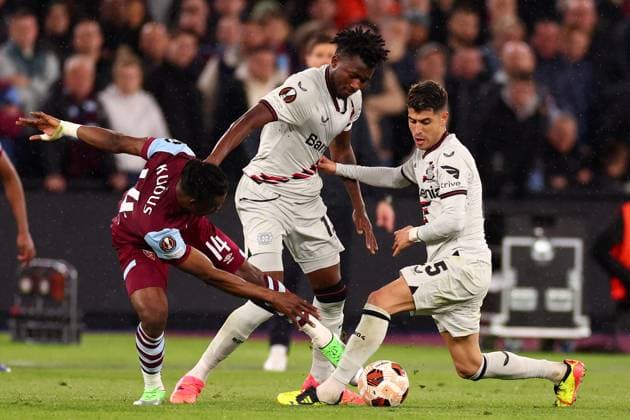 18th April 2024; London Stadium, London, England; Europa League Football, Quarter Final, Second Leg, West Ham United versus Bayer Leverkusen; Mohammed Kudus of West Ham United challenges Exequiel Palacios of Bayer Leverkusen  ActionPlus12631914 ShaunxBrooks