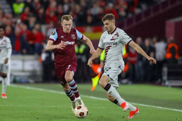 London, England, April 18th 2024: Josip Stanisic (2 Bayer Leverkusen) makes a pass while receiving pressure from James Ward-Prowse (7 West Ham United) during the UEFA Europa League match between West Ham United and Bayer Leverkusen at the London Stadium in London, England (Alexander Canillas SPP) Copyright: xAlexanderxCanillas SPPx spp-en-AlCa-0V1A2963