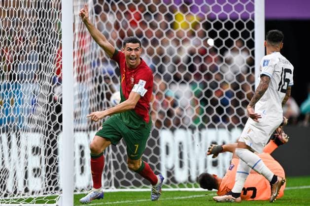 2022-11-28 Portugal v Uruguay - Group H - FIFA World Cup, WM, Weltmeisterschaft, Fussball Qatar 2022 LUSAIL CITY, QATAR - NOVEMBER 28: Cristiano Ronaldo of Portugal celebrates after scoring his sides first goal during the Group H - FIFA World Cup Qatar 2022 match between Portugal and Uruguay at the Lusail Stadium on November 28, 2022 in Lusail City, Qatar (Photo by Pablo Morano BSR Agency) Lusail City Qatar Content not available for redistribution in The Netherlands directly or indirectly through any third parties. Copyright: xBSRxAgencyx