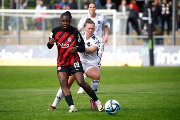 20.04.2024, xavx, Fussball 1.Bundesliga Damen, Eintracht Frankfurt Frauen - 1.FC Nürnberg emspor, v.l. Nicole Anyomi (Eintracht Frankfurt), Jessica May (1.FC Nürnberg) (DFL DFB REGULATIONS PROHIBIT ANY USE OF PHOTOGRAPHS as IMAGE SEQUENCES and or QUASI-VIDEO) Frankfurt am Main