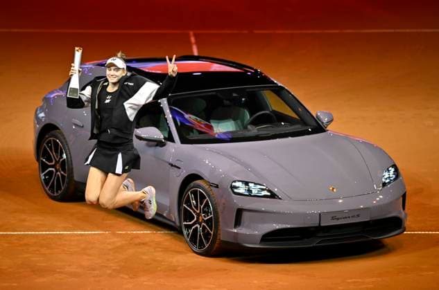 Siegerehrung, Ehrung Elena Rybakina (KAZ) mit Pokal vor Siegerfahrzeug Porsche Taycan 4S Turismo Sprung springt Jubel Freude Emotion Tennis Damen Porsche-Cup Porsche Tennis Grand Prix GP Stuttgart 2024 Porsche Arena 21.04.2024 DFL REGULATIONS PROHIBIT ANY USE OF PHOTOGRAPHS AS IMAGE SEQUENCES AND OR QUASI-VIDEO Porsche Tennis Grand Prix GP Stuttgart 2024