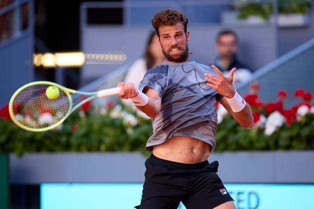 Mutua Madrid Open - Day One Stefano Napolitano of Italy returns a shot against Richard Gasquet of France during day one of the Mutua Madrid Open 2024 at Caja Magica on April 22, 2024, in Madrid, Spain. Madrid Caja Magica Madrid Spain RL_MMO24_227 Copyright: xRicardoxLarreinax