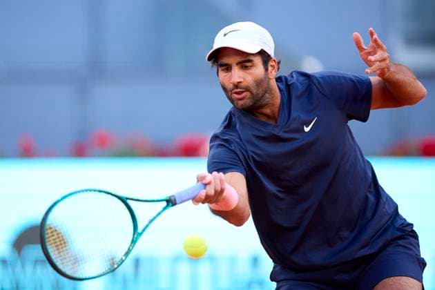 Mutua Madrid Open - Day One Benjamin Hassan of Germany returns a shot against Emilio Nava of USA during day one of the Mutua Madrid Open 2024 at Caja Magica on April 22, 2024, in Madrid, Spain. Madrid Caja Magica Madrid Spain RL_MMO24_253 Copyright: xRicardoxLarreinax