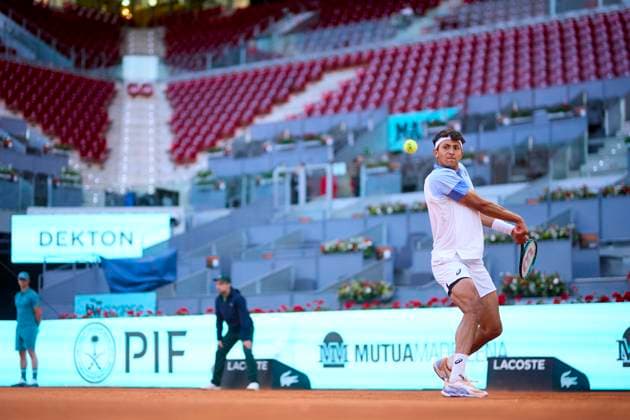 Mutua Madrid Open - Day One Emilio Nava of USA returns a shot against Benjamin Hassan of Germany during day one of the Mutua Madrid Open 2024 at Caja Magica on April 22, 2024, in Madrid, Spain. Madrid Caja Magica Madrid Spain RL_MMO24_257 Copyright: xRicardoxLarreinax