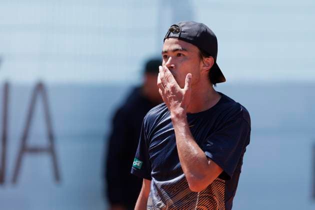 MADRID, SPAIN - APRIL 24: Taro Daniel of Japon returns the ball during their match against Aleksandar Vukic on Day 3 of the Mutua Madrid Open at Caja Magica Stadium in Madrid. ONLYxEDITORIALxUSAGE  (251128158)