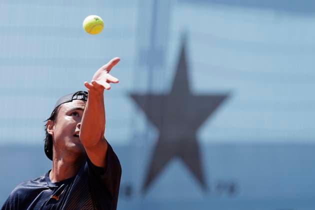 MADRID, SPAIN - APRIL 24: Taro Daniel of Japon returns the ball during their match against Aleksandar Vukic on Day 3 of the Mutua Madrid Open at Caja Magica Stadium in Madrid. ONLYxEDITORIALxUSAGE  (251128169)