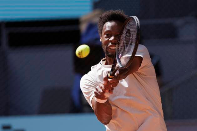 MADRID, SPAIN - APRIL 24: Gael Monfils returns a shot against Luciano Darder during their match on Day 3 of the Mutua Madrid Open at Caja Magica Stadium in Madrid. ONLYxEDITORIALxUSAGE  (251138033)
