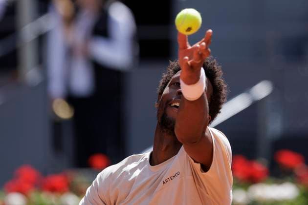 MADRID, SPAIN - APRIL 24: Gael Monfils returns a shot against Luciano Darder during their match on Day 3 of the Mutua Madrid Open at Caja Magica Stadium in Madrid. ONLYxEDITORIALxUSAGE  (251138041)