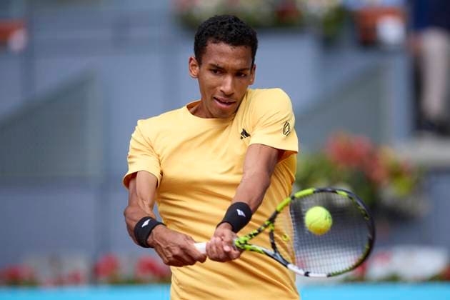 Mutua Madrid Open - Day Four Felix Auger-Aliassime of Canada returns a shot against Yoshihito Nishioka of Japan during day four of the Mutua Madrid Open 2024 at Caja Magica on April 25, 2024, in Madrid, Spain. Madrid Caja Magica Madrid Spain RL_MMO24_00531 Copyright: xRicardoxLarreinax