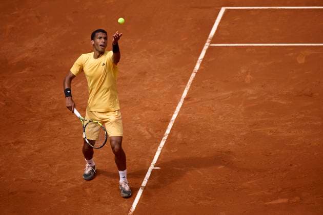 Mutua Madrid Open - Day Four Felix Auger-Aliassime of Canada serves against Yoshihito Nishioka of Japan during day four of the Mutua Madrid Open 2024 at Caja Magica on April 25, 2024, in Madrid, Spain. Madrid Caja Magica Madrid Spain RL_MMO24_00590 Copyright: xRicardoxLarreinax