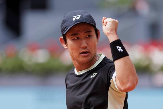 MADRID, SPAIN - APRIL 25:Yoshihito Nishioka celebrates against Felix Auger during their match on Day 4 of the Mutua Madrid Open at Caja Magica Stadium in Madrid. ONLYxEDITORIALxUSAGE  (251219102)