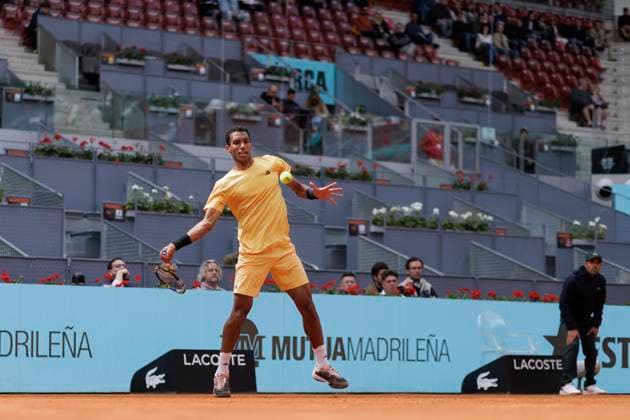 MADRID, SPAIN - APRIL 25:Felix Auger returns a shot against Yoshihito Nishioka during their match on Day 4 of the Mutua Madrid Open at Caja Magica Stadium in Madrid. ONLYxEDITORIALxUSAGE  (251219124)