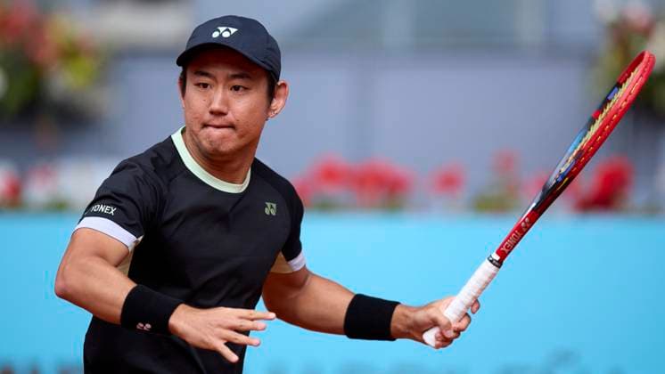 Yoshihito Nishioka of Japan returns a shot against Felix Auger-Aliassime of Canada during day four of the Mutua Madrid Open 2024 at Caja Magica on April 25, 2024, in Madrid, Spain.  (251221710)